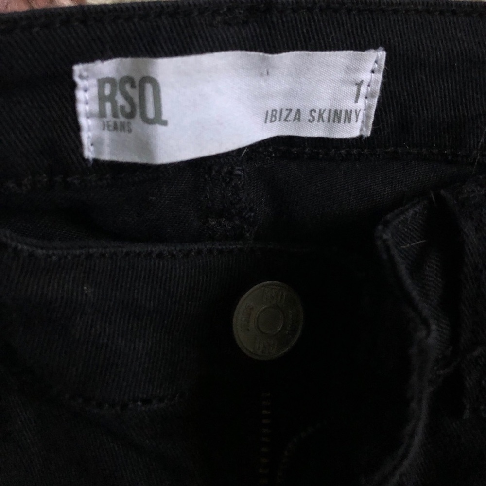 Ripped black skinny jeans